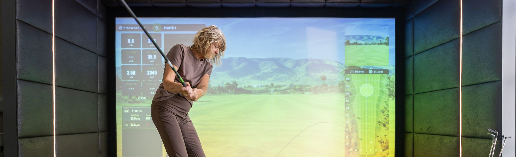 lady playing indoor golf